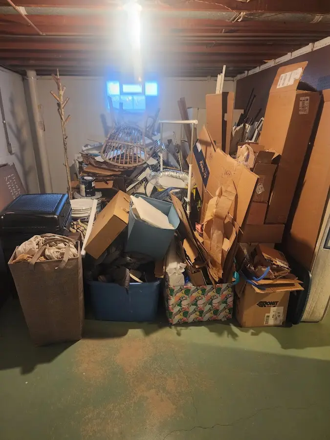 Roll-off dumpster container at job site for Yard Waste Dumpster Rental in Carlstadt